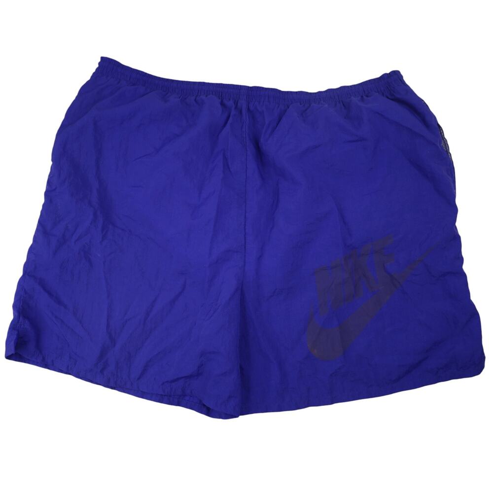 Vintage 90s Nike Big Spellout Swim Trunks. Features 90s gray tag